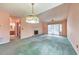 Inviting living room with a fireplace, large sliding doors to the deck, and an open view to the kitchen at 350 Pleasant Oak Sw Ct, Marietta, GA 30008