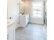 Bright bathroom with white vanity, sleek fixtures, and a glass-enclosed shower at 2462 Adair Ridge Ct, Decatur, GA 30034