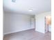 Bright bedroom with a window and doorway leading to bathroom at 2462 Adair Ridge Ct, Decatur, GA 30034