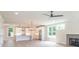 Open-concept living room and kitchen with hardwood floors and fireplace at 2462 Adair Ridge Ct, Decatur, GA 30034
