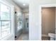 Modern tiled shower stall with glass door and window for natural light at 2462 Adair Ridge Ct, Decatur, GA 30034