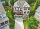 Aerial view of a beautiful brick home with a covered porch and landscaped yard at 3394 Bryerstone Se Cir, Smyrna, GA 30080