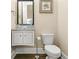 Powder room with modern vanity and fixtures at 3394 Bryerstone Se Cir, Smyrna, GA 30080