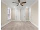 Bedroom with two closets and a ceiling fan at 3394 Bryerstone Se Cir, Smyrna, GA 30080