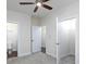 Bright bedroom with multiple doors and a ceiling fan at 3394 Bryerstone Se Cir, Smyrna, GA 30080