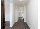 Elegant hallway featuring hardwood floors and white trim at 3394 Bryerstone Se Cir, Smyrna, GA 30080