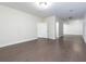 Spacious living room featuring beautiful dark hardwood floors and neutral walls at 3394 Bryerstone Se Cir, Smyrna, GA 30080