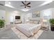 Serene main bedroom with neutral decor, plush carpeting, and a stylish ceiling fan at 3394 Bryerstone Se Cir, Smyrna, GA 30080