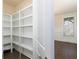 Walk-in pantry with custom built-in shelving, allowing for optimized storage space at 3394 Bryerstone Se Cir, Smyrna, GA 30080