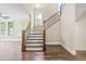 Staircase with hardwood steps and iron railings at 3394 Bryerstone Se Cir, Smyrna, GA 30080
