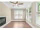 Bright sun room features a fireplace and multiple windows at 3394 Bryerstone Se Cir, Smyrna, GA 30080