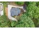 Aerial view of the property showcasing the roof, backyard, and driveway at 4355 Old Hamilton Mill Rd, Buford, GA 30518