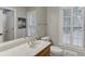 Bright bathroom featuring neutral walls, plantation shutters, and natural light, showcasing a clean design at 4355 Old Hamilton Mill Rd, Buford, GA 30518