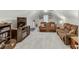 Comfortable bonus room featuring plush carpeting and a pair of overstuffed couches at 4355 Old Hamilton Mill Rd, Buford, GA 30518