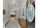 Welcoming foyer featuring hardwood floors, neutral paint, and stylish decor at 4355 Old Hamilton Mill Rd, Buford, GA 30518