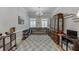 Spacious game room area featuring hardwood floors, ample space for entertainment, and natural light at 4355 Old Hamilton Mill Rd, Buford, GA 30518