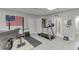 A home gym featuring rubber mats, workout equipment, and motivational decor at 4355 Old Hamilton Mill Rd, Buford, GA 30518