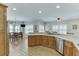 Bright kitchen featuring hardwood floors, stainless steel appliances, and lots of natural light at 4355 Old Hamilton Mill Rd, Buford, GA 30518