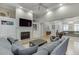 Bright living room with hardwood floors, a fireplace, built-ins, and an open layout at 4355 Old Hamilton Mill Rd, Buford, GA 30518