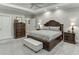 Inviting main bedroom with neutral tones, a tray ceiling, and an en suite bathroom at 4355 Old Hamilton Mill Rd, Buford, GA 30518