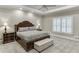 Large main bedroom with plush carpeting, tray ceiling, and stylish furniture at 4355 Old Hamilton Mill Rd, Buford, GA 30518