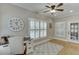 Bright home office with natural light, hardwood floors and a comfortable workspace area with a desk at 4355 Old Hamilton Mill Rd, Buford, GA 30518