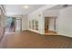 Screened back porch with wood flooring and views of the surrounding landscape at 4567 Brigade Ne Ct, Roswell, GA 30075