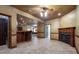Finished basement with a bar area, fireplace, and tile flooring, perfect for entertaining at 4567 Brigade Ne Ct, Roswell, GA 30075