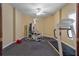Well-lit exercise room featuring modern equipment, rubber flooring, and a ceiling fan at 4567 Brigade Ne Ct, Roswell, GA 30075