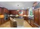 Gourmet kitchen features custom cabinetry, stainless steel appliances, and a center island at 4567 Brigade Ne Ct, Roswell, GA 30075