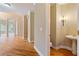Half bathroom with a pedestal sink, stylish lighting, and hardwood floors at 4567 Brigade Ne Ct, Roswell, GA 30075