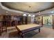 Finished basement featuring a pool table, wet bar, and gym at 4567 Brigade Ne Ct, Roswell, GA 30075
