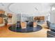 Community lounge with a kitchen, islands, seating, and elegant modern decor at 711 Cosmopolitan Ne Dr # 300, Atlanta, GA 30324