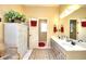 Bathroom with double sink vanity and neutral walls at 1935 Shrader Ct, Lawrenceville, GA 30044