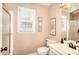 Bathroom with vanity and tiled shower at 1935 Shrader Ct, Lawrenceville, GA 30044
