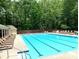A lovely community pool with lounge chairs is perfect for a relaxing swim at 1935 Shrader Ct, Lawrenceville, GA 30044