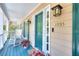 Inviting front porch with rocking chairs, perfect for relaxing and enjoying the neighborhood view at 1935 Shrader Ct, Lawrenceville, GA 30044