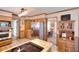 Spacious kitchen featuring stainless steel appliances and a view into the sunny dining area at 1935 Shrader Ct, Lawrenceville, GA 30044
