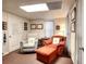 Relaxing room with cozy chairs, decorated with framed certificates and a soothing ambiance at 1935 Shrader Ct, Lawrenceville, GA 30044