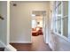Hallway view of the living room with cozy seating and bright interior lighting at 1935 Shrader Ct, Lawrenceville, GA 30044
