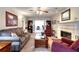 Comfortable living room with a cozy fireplace and space for relaxation and entertainment at 1935 Shrader Ct, Lawrenceville, GA 30044