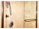 An updated shower with tile surround, glass door, and chrome fixtures for a modern bathing experience at 1935 Shrader Ct, Lawrenceville, GA 30044