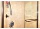 Shower stall featuring beige tile, shower caddy and clear glass doors at 1935 Shrader Ct, Lawrenceville, GA 30044
