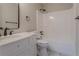 Bathroom features a white vanity and a bathtub with shower at 4565 English Oaks Ln, Lilburn, GA 30047