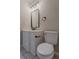 Bathroom features a white vanity with drawers and a toilet at 4565 English Oaks Ln, Lilburn, GA 30047