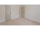 Carpeted bedroom showing the base trim with light grey painted doors and walls at 4565 English Oaks Ln, Lilburn, GA 30047