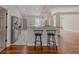 The kitchen is equipped with granite counters, stainless steel appliances, and a breakfast bar at 4565 English Oaks Ln, Lilburn, GA 30047