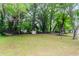 The property features a large backyard with a storage shed at 551 Barnes Mill Dr, Marietta, GA 30062