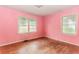Vacant bedroom with hardwood floors and natural lighting at 551 Barnes Mill Dr, Marietta, GA 30062