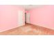 Vacant bedroom with hardwood floors and natural lighting at 551 Barnes Mill Dr, Marietta, GA 30062